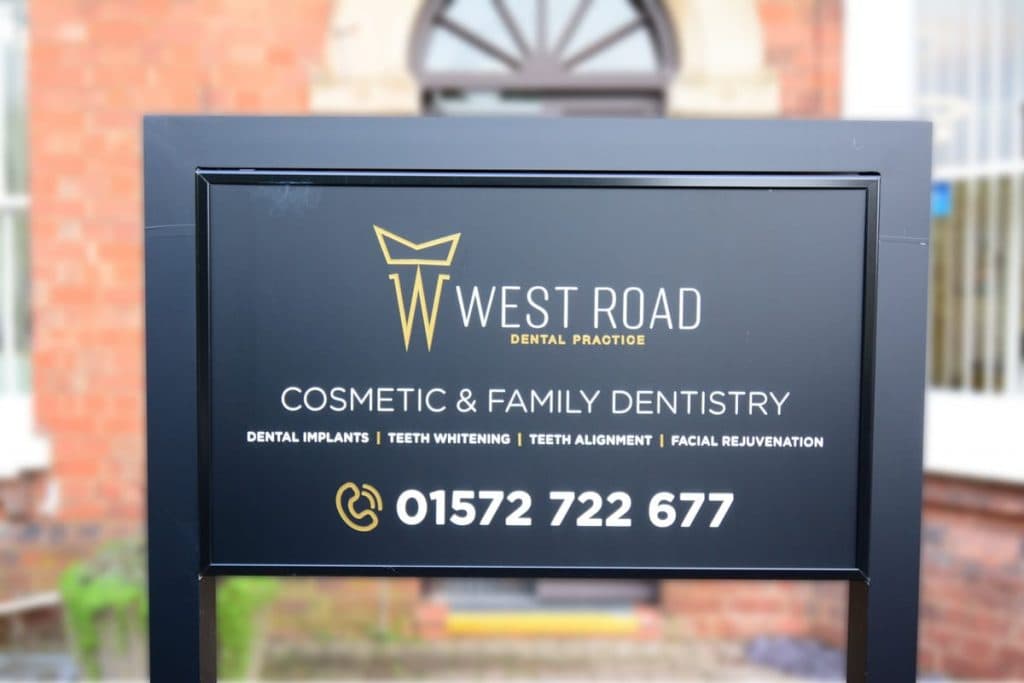 The West Road Dental Practice sign outside the Oakham surgery, reading Cosmetic and Family Dentistry